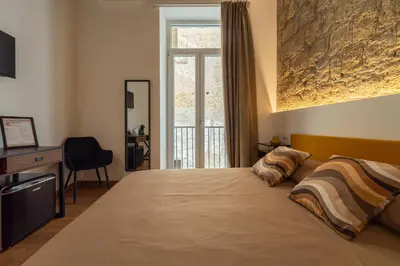 Letto o letti in una camera di Figurari 16 Rooms
