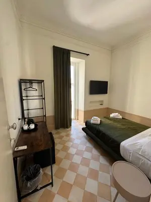 Letto o letti in una camera di Gradini dell arte