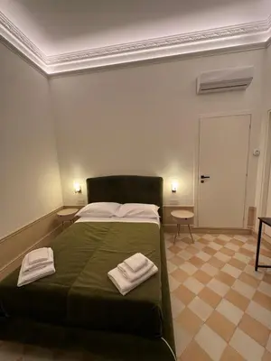 Letto o letti in una camera di Gradini dell arte