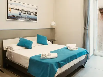 Letto o letti in una camera di Core Napoli