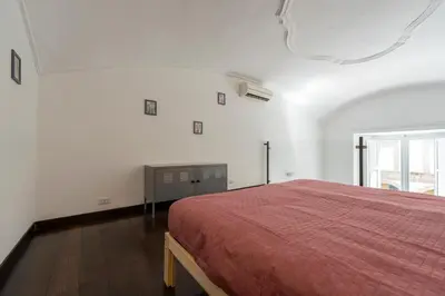 Letto o letti in una camera di Living Filomarino