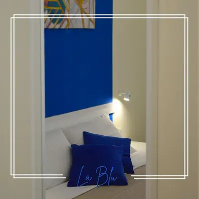 Letto o letti in una camera di EMME Napoli II