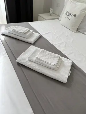 Letto o letti in una camera di Tiaré Home Napoli