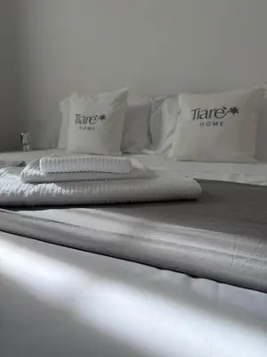 Letto o letti in una camera di Tiaré Home Napoli