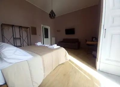 Letto o letti in una camera di Syrenhouse