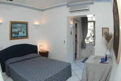 Letto o letti in una camera di BLUE DREAM - Ad un passo dai castelli e dal mare - CHIAIA