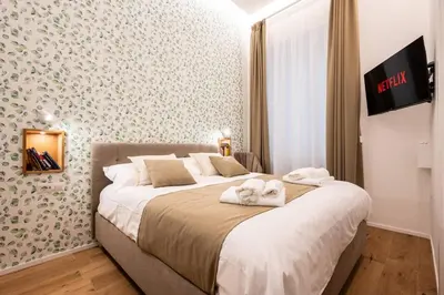 Letto o letti in una camera di L'Eco del Centro Charme nel cuore di Napoli
