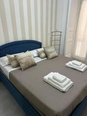 Letto o letti in una camera di Nicotera Apartment