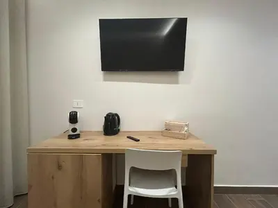TV o dispositivi per l'intrattenimento presso Suite Conte' Piazza Garibaldi