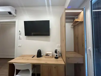 TV o dispositivi per l'intrattenimento presso Suite Conte' Piazza Garibaldi