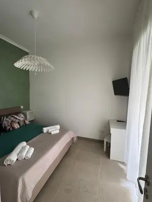 Letto o letti in una camera di Bianchina House