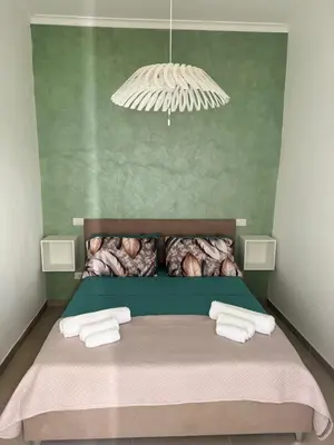 Letto o letti in una camera di Bianchina House