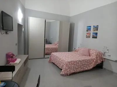 Letto o letti in una camera di al vecchio lanificio