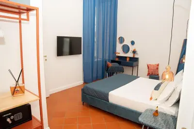 Letto o letti in una camera di Palazzo Castriota Scanderbeg Apartment - City Center Apartment