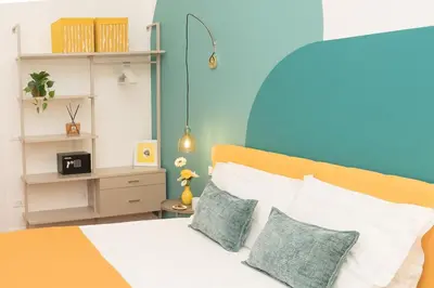 Letto o letti in una camera di Palazzo Castriota Scanderbeg Apartment - City Center Apartment