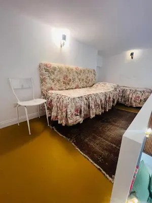 Letto o letti in una camera di Alice's new studio apartment in the center of Chiaia