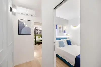 Letto o letti in una camera di Mama Apartment