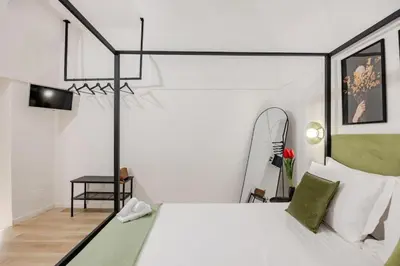 Letto o letti in una camera di Mama Apartment