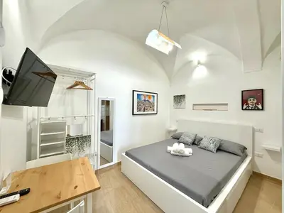 Letto o letti in una camera di Je sto vicino a te