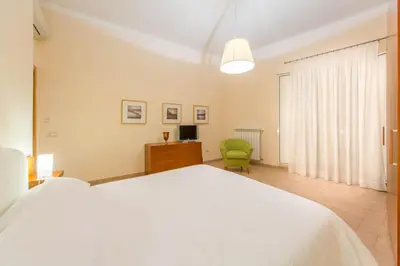 Letto o letti in una camera di La Residenza