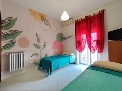Letto o letti in una camera di Albi House Vomero