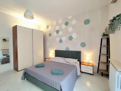 Letto o letti in una camera di Albi House Vomero