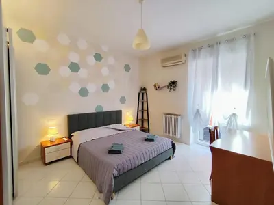 Letto o letti in una camera di Albi House Vomero