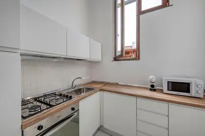 Cucina o angolo cottura di Luxury Sea Front Penthouse - B Home