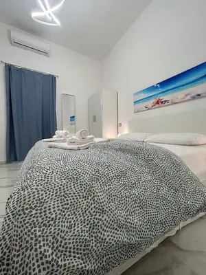 Letto o letti in una camera di Nel cuore di Napoli-Welcome to the Heart of Naples