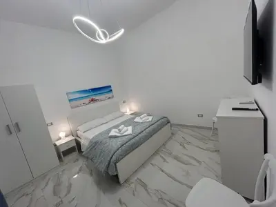 Letto o letti in una camera di Nel cuore di Napoli-Welcome to the Heart of Naples