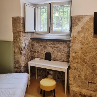 Letto o letti in una camera di Casa Dadè