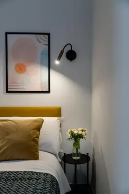 Letto o letti in una camera di Plebiscito Luxury Rooms