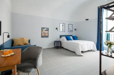 Letto o letti in una camera di Plebiscito Luxury Rooms