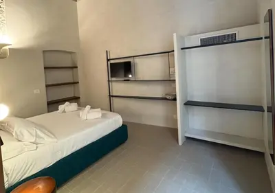 Letto o letti in una camera di Dal Console Rooms