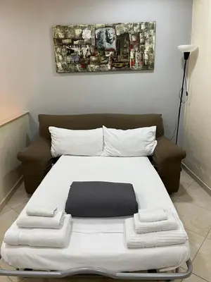 Letto o letti in una camera di Nanet House