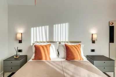Letto o letti in una camera di Residenze Piazza Dante