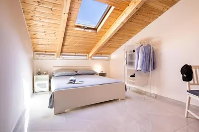 Letto o letti in una camera di La cà di giuliettae