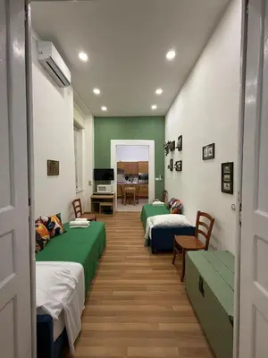 Letto o letti in una camera di Casa Donna Caterina