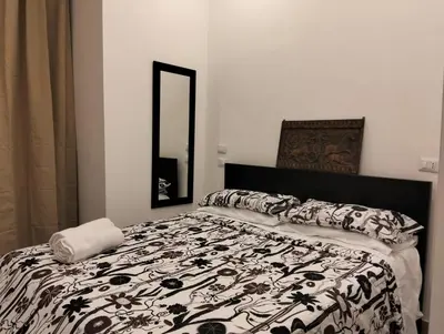 Letto o letti in una camera di La Porta di Napoli