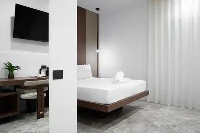 Letto o letti in una camera di Rumi Luxury Rooms