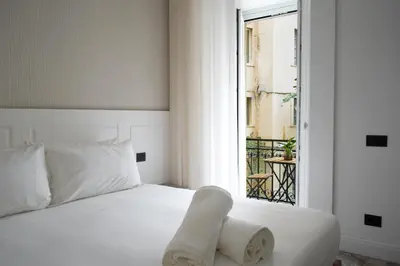 Letto o letti in una camera di Rumi Luxury Rooms