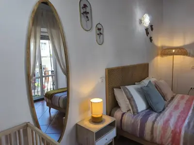Letto o letti in una camera di Regina Partenope Home