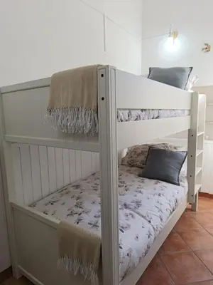 Letto o letti in una camera di Regina Partenope Home