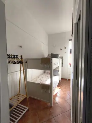 Letto o letti in una camera di Regina Partenope Home