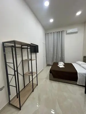 Letto o letti in una camera di HV 95 NAPOLi