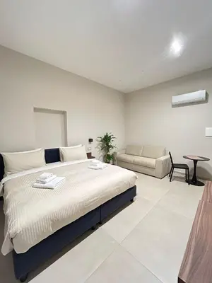 Letto o letti in una camera di B&B Palazzo Domini