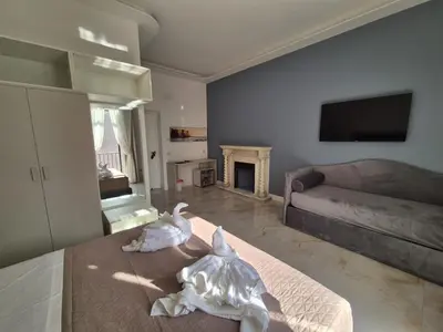 TV o dispositivi per l'intrattenimento presso Arco Boutique Rooms