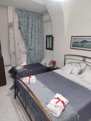 Letto o letti in una camera di La Casa di Nonno Gennaro