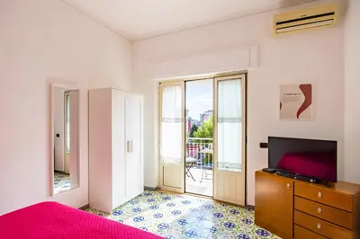 Letto o letti in una camera di Casa MariaPia al Vomero by Napoliapartments