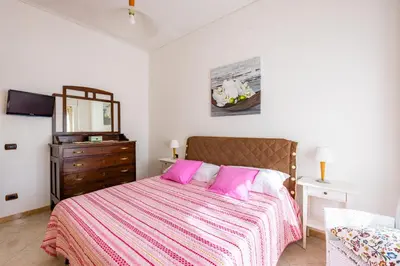 Letto o letti in una camera di Casa MariaPia al Vomero by Napoliapartments
